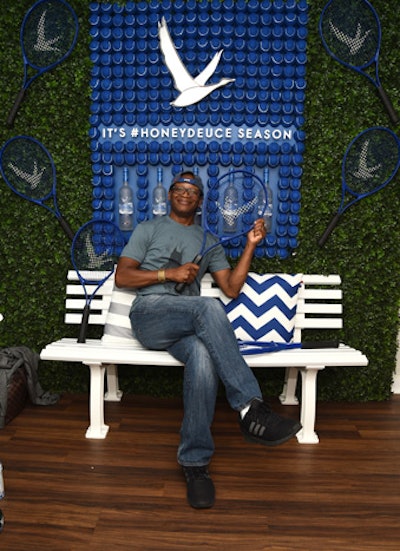 At the 2017 U.S. Open, which took place at the USTA Billie Jean King National Tennis Center in the Flushing Meadows-Corona Park section of Queens, sponsor Grey Goose served the tournament’s official cocktail. The vodka brand also had its first-ever suite at the stadium. Decor included a branded step-and-repeat created with tennis balls and rackets in the brand’s signature blue color.