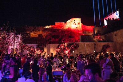 The “Homeric Ball” took place in the custom-built ruins of a Doric-style temple at an abandoned iron factory on a cliff overlooking the Aegean Sea.