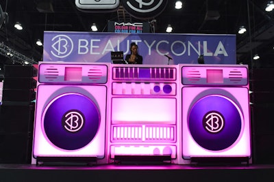 When attendees first entered the convention, they were greeted by a larger-than-life DJ booth in the shape of a neon boombox—which also created a memorable backdrop for photos.