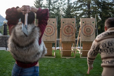 The 'Oh! Canada Cozy Cabin Welcome Party,' held on the hotel’s Garden Terrace, included canvas lounge tents, ax throwing, sled dogs, and a Calgary-based band.