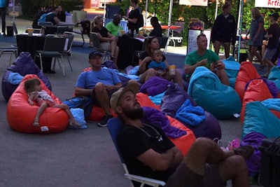 Families were also invited to a screening of Moana on the Anaheim Convention Center’s 36,000-square-foot Grand Plaza. The evening included seating on bean bags, photos ops with a Moana lookalike, and movie snacks.