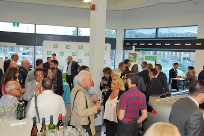 Event guests enjoying the bar and catering