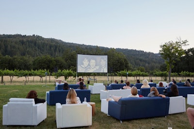 Guests watched a screening of the documentary Desolation Center on the lawn at Sterling Vineyards lawn. Cort Furniture Rental couches turned the space into an outdoor living room. Director Stuart Swezey introduced the film, which tells the story of Swezey's effort to organize the first concerts in the Mojave Desert.