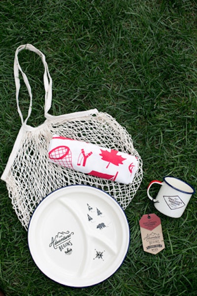 At the welcome party, guests could take home a campfire “mess kit” complete with an enamel plate and mug and branded tea towel.