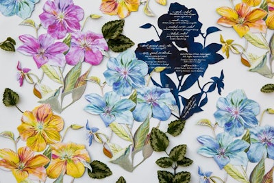 Cut-out floral menus were tucked into napkins during the wildflower-theme lunch.