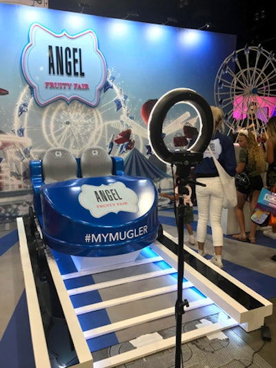 Angel Fruity Fair, a new perfume by Mugler, also had a carnival-theme space where guests could pose in a roller coaster car.