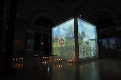 The experience was housed in a 15-foot cube structure that featured 360-degree video projections of Scottish scenery and the distillery. The video was captured by drones and a remote-controlled robot.