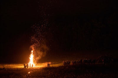 The festivities culminated with a 20-foot-high bonfire.