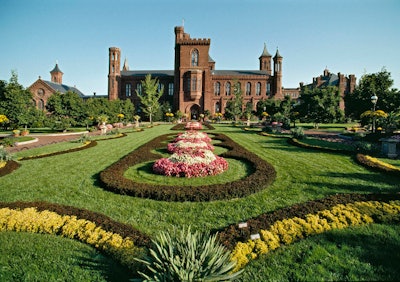 The formal garden at Smithsonian Castle features seasonal plantings along its paths and in a central parterre.