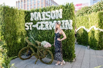 Elderflower French liqueur St-Germain and landscape artist Lily Kwong celebrated the summer solstice by creating a floral installation and a hedge maze, which debuted in June 2017 on the High Line in New York. The maze included a bicycle covered in greenery, designed to resemble topiary.