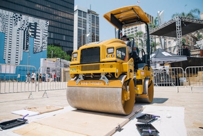 Another interactive art installation involved linocut prints created with an actual steamroller. “We wanted to over-dramatize the lino print process,” explained Ball. “The consumer would have the opportunity to ink up their lino print before a steamroller would roll over it to create their one-off custom print.”