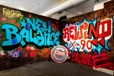 Graffiti on the walls promoted the New Balance and Foot Locker brands.