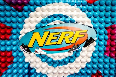 A wall made from Nerf toys offered a fun photo op.