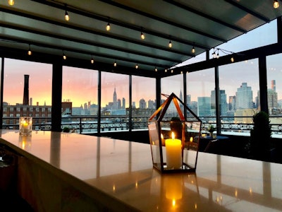 Gorgeous Sunset from our All Marble Bar Retractable Rooftop Events Venue