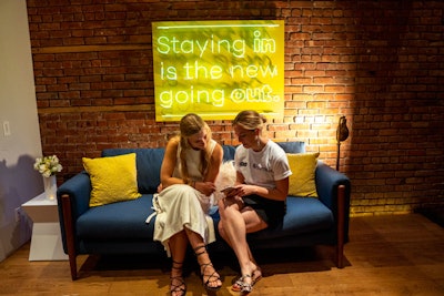 The experience took place August 15 and 16 at Sousa House NYC. The four-story townhouse was decked in on-theme branding and signs, including a neon sign that read: “Staying in is the new going out.”