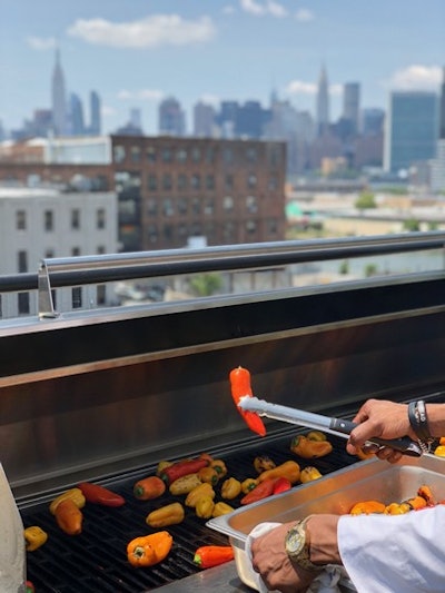 Live Chef Grilling for Guests with Quite a View