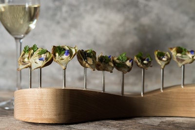 Mini fried artichokes with champagne aioli, borage flower and petite herbs