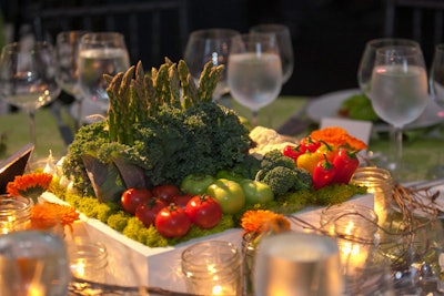 The Peggy Notebaert Nature Museum's Butterfly Ball, held in Chicago in May 2013, had a farm-like atmosphere. Playing off the event's “Savour Nature” theme, which highlighted the new exhibition “Food: The Nature of Eating,” Event Creative brought in vegetable-centric decor. Tables were decked with miniature gardens potted with tomatoes, colorful peppers, asparagus, and kale; around the centerpieces, fairy lights in miniature Mason jars added to the elegant yard-party vibe.
