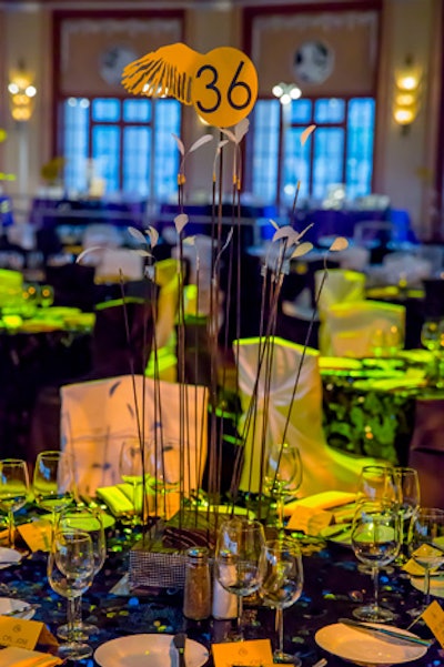 The Catalina Island Conservancy celebrated its 22nd annual ball in April 2017 at the Avalon Casino Ballroom. The 500-attendee event had a “Taking Flight” theme, which documented the conservancy’s work to monitor the Southern California island’s seabirds. Centerpieces were made from tall twig-like wires, which had a table number on top in the shape of a bird wing. The conservancy designed the event and the centerpieces in-house.