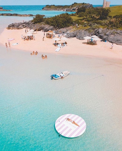 Custom floating pontoons served as a prop for fashion photography via drone during a yacht and beach day at Fricks Point. The outing included drinks from Twisted Spoon Cocktails and salads and local grilled fish from Take Five Catering.