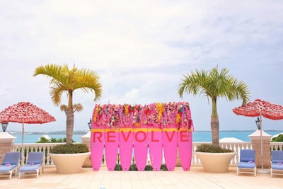 One of the pools at Rosewood Bermuda included a surfboard installation adorned with the Revolve logo as a photo opp.