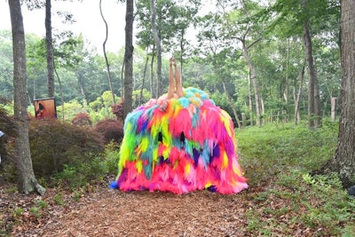 'Lonely' by Hrafnhildur Arnardottir, an Icelandic artist known as Shoplifter, was one of several focal points in the forest of installations. It featured two legs jutting out from a large pile of brightly colored furs.