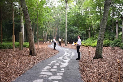 The main cocktails path took guests immediately into the forest of art installations; directly adjacent to the dinner check-in was a second path that took attendees through the main building and directly into the cocktail/silent auction space.