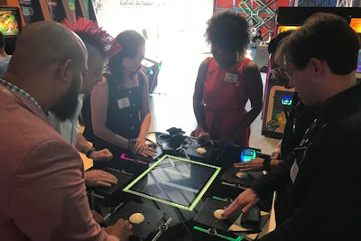 Some arcade games require as many as six players—which organizers say was intentional to promote face-to-face bonding. “People show up to events and places like this in pairs, in threes, but nobody shows up in sixes,” explained co-founder Eric Gradman. “So you’re almost guaranteed to be standing across from someone you don’t know. And one thing we’ve discovered running games like this is that people who play together, stay together, and keep wandering around the park together. You make new friends around games like this.”