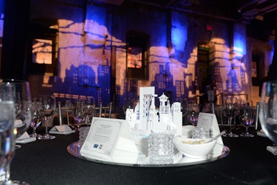 In January 2016, the Walrus Foundation hosted its annual gala at the Fermenting Cellar in Toronto. The event paid homage to the Canadian city, and the skyline appeared in imagery at the bar, on the walls, and more. Tabletops were decked with miniature renderings of the Toronto skyline, created in paper by artist Kalpna Patel.