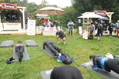 Swisse ambassador and celebrity trainer Luke Milton hosts Movement Mate, a full-body movement class designed to loosen up muscles and joints after the Wanderlust workouts.