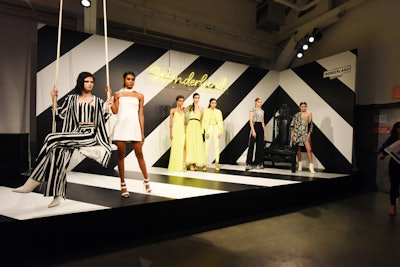 The fantastical “Wonderland” area boasted graphic ‘80s-inspired looks against a black and white striped background.