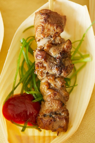 Filipino barbecue chicken skewers with scallion salad and banana ketchup
