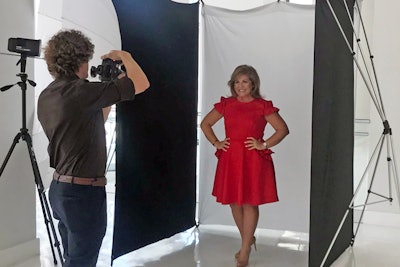 Phillip Van Nostrand photographs a subject for the “First Impressions” campaign.