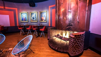 Warm yourself by the fireplace in Bowlero’s lounge.