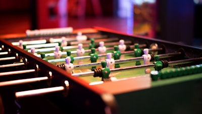 Classic table games including foosball, billiards, and beer pong at Bowlero Torrance.