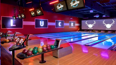 HD video walls and blacklight lanes in Bowlero’s private bowling suite.