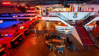 A view of the lanes and Bowlmor’s elevated loft lounge.