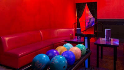 Plush laneside loungers for an epic bowling experience.