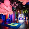 Guests were greeted with rainbow curtains, oversize balloons, disco balls, 'TurnOut' signage, and a carpet emblazoned with the campaign's logo as they entered the gala. The welcome room became a popular spot for guest photo ops.