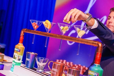 In the V.I.P. lounge area, Smirnoff showed off its redesigned 2018 “Love Wins” bottles and a dramatic pour-over drink presentation.