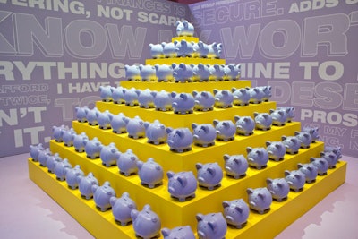 Refinery29 promoted its new book based on its popular Money Diaries franchise with a purple pyramid of piggy banks.