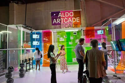 At the Aldo Artcade, attendees could play video games and shoot hoops. Transparent gumball machines held fortunes, and shoes inside clear display cases decorated the area.