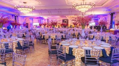 Gala Decoration featuring tall arrangements with Jean Storey Orchids