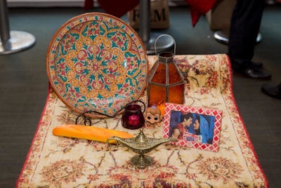 Tyler Wisler’s Moroccan-theme tabletop paid tribute to Aladdin with a Nourison carpet, a Funko Pop figure of the monkey Abu, and a genie lamp.