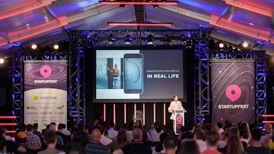 Lifestyle Blogger Amber Venz Box discusses tech startups and innovation at StartupFest in Montreal, Canada.