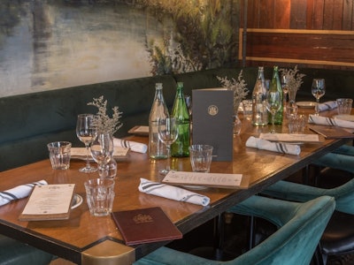 The Snug's boardroom table accommodates a seated dinner for 12