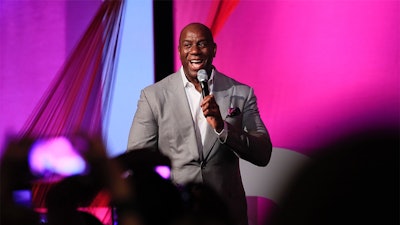 NBA Legend Magic Johnson speaking about developing a successful business strategy at BOLD MINDBODY conference.