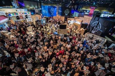 In a fun twist for ComplexCon fans, nine custom Adidas gumball machines were placed throughout the convention; attendees who won a golden ticket were invited to attend a raffle of rare and exclusive Adidas items. YouTube star Qias Omar emceed the high-energy event, giving guests custom paddles with unique codes; a lottery ball machine determined the winner.