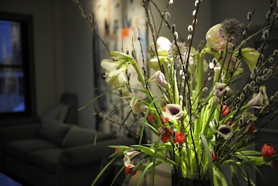 Calla lilies, cattails, amaryllis, and tulips make a statement in a resident's home
