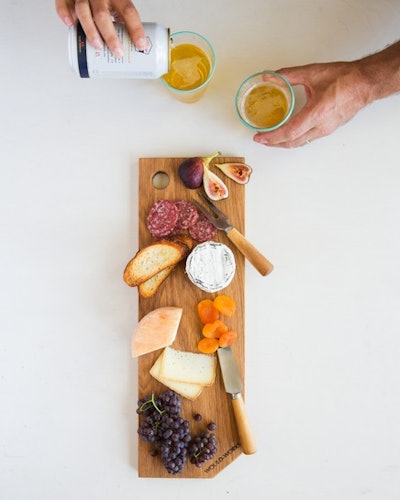 Engrave your logo on handmade charcuterie boards for a unique, luxe gift for any executive